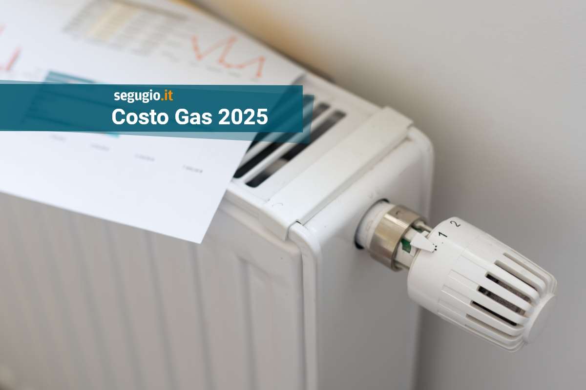 prezzi del gas bolletta posata sopra a un termosifone