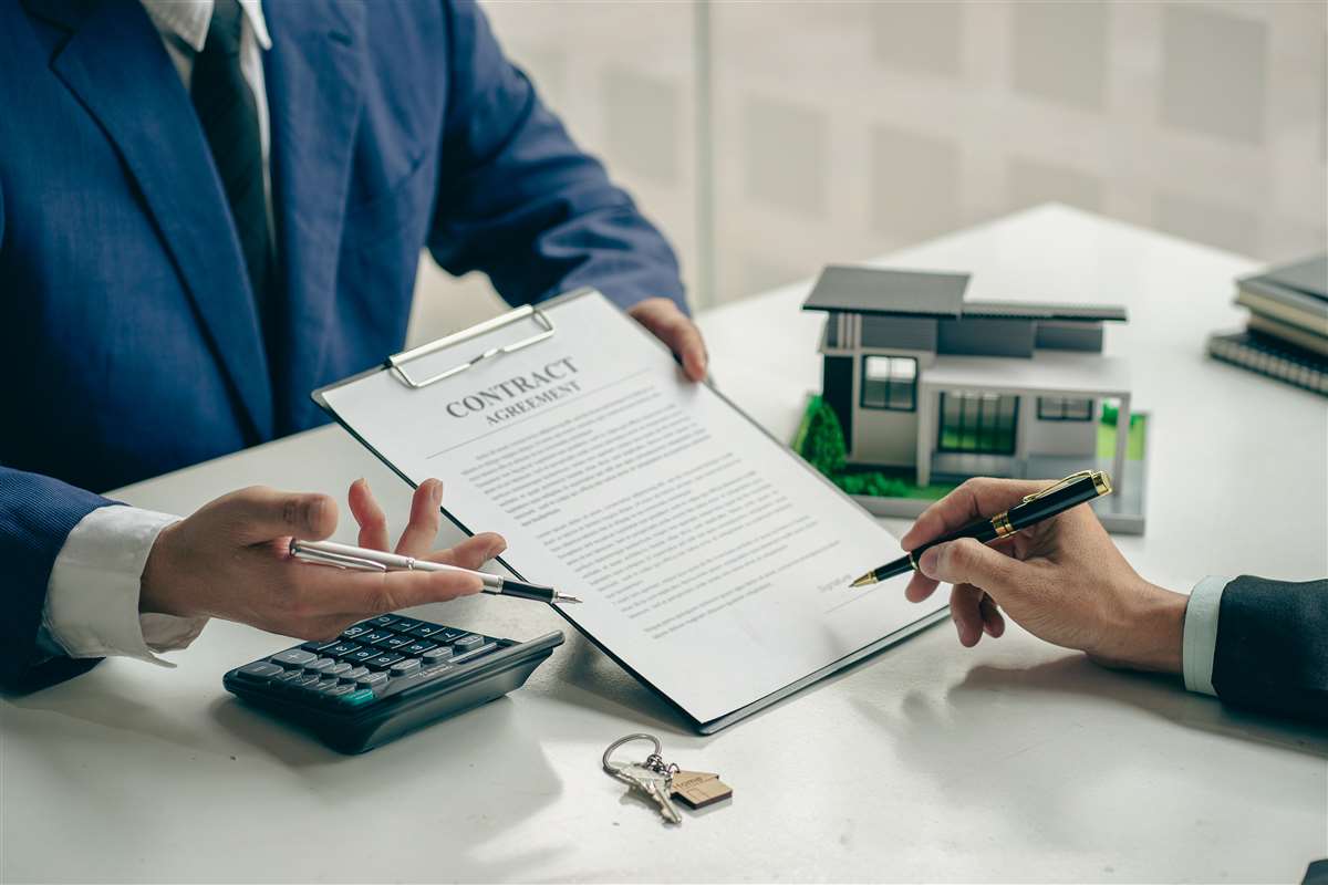 costo mutuo di 100 mila in 30 anni un mutuatario firma ill proprio contratto di mutuo