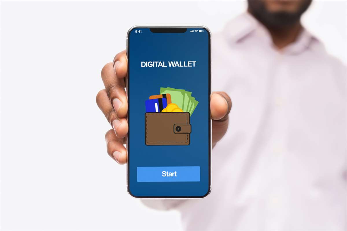 it wallet una mano tiene uno smartphone che mostra l'it wallet