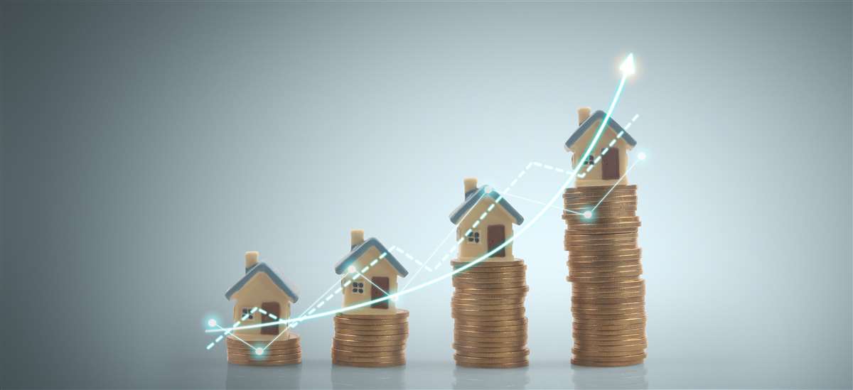 rendimenti acquisto seconda casa una casa con un grafico in crescita o delle monete