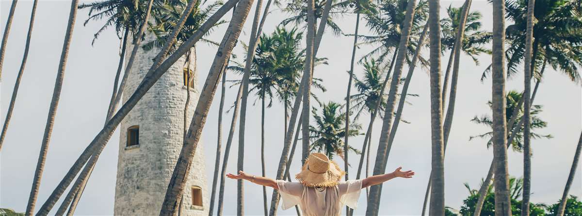 prestiti per vacanze una donna in un'isola tropicale