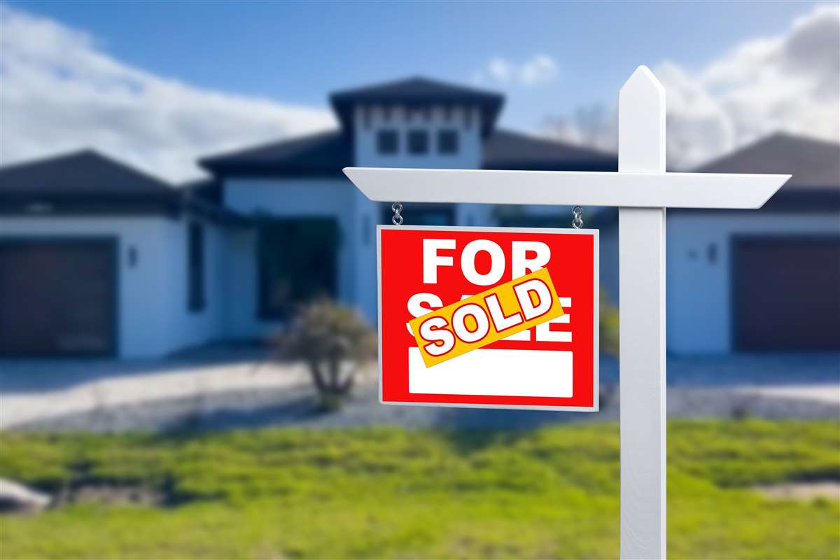 compravendite immobiliari casa con cartello venduta
